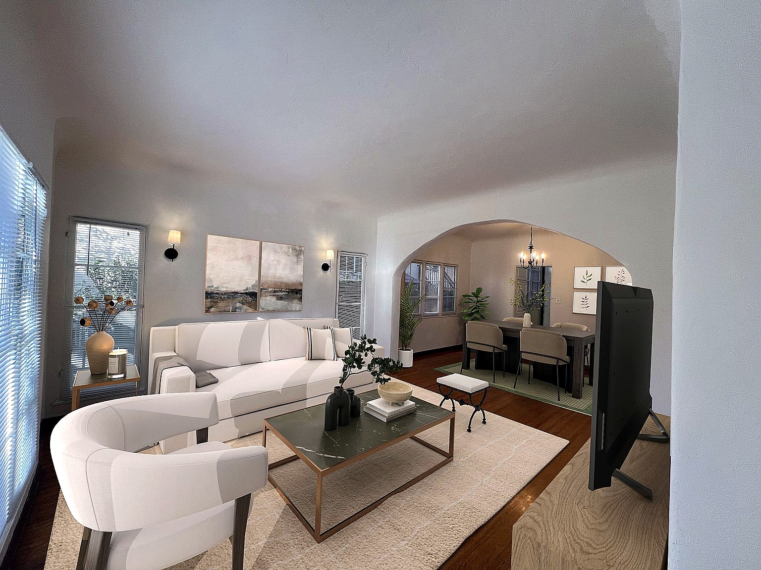 Bright living and dining areas with hardwood floors and an open flow